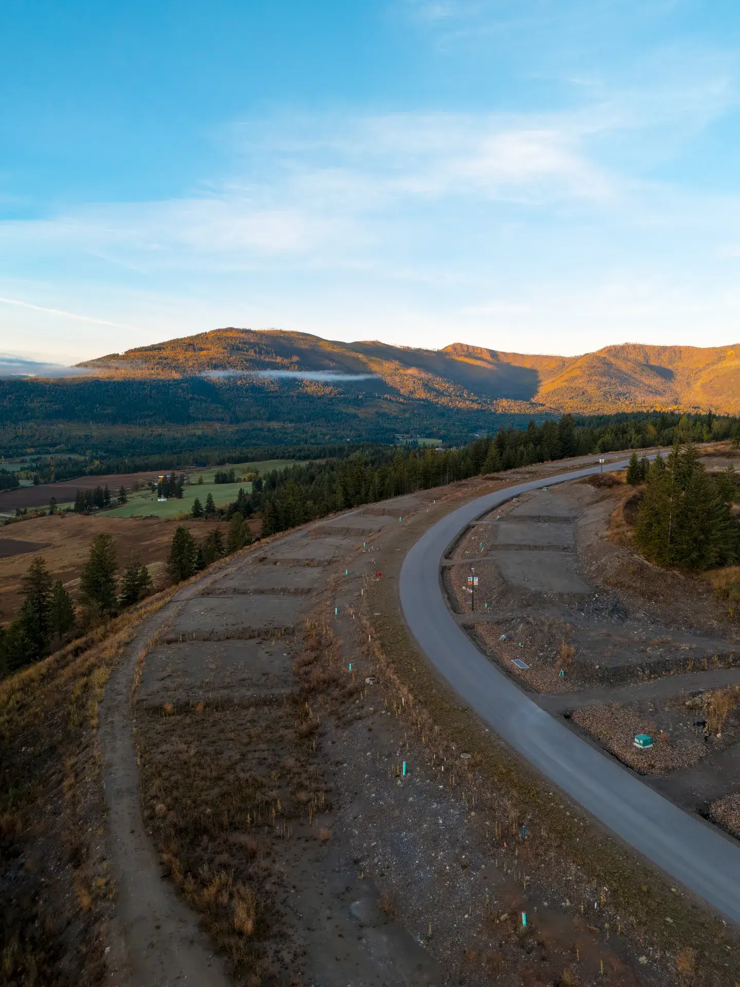 Valley view lots in Blind Bay: fresh pavement and graded lots along the east arm of Highlands Drive at The Highlands