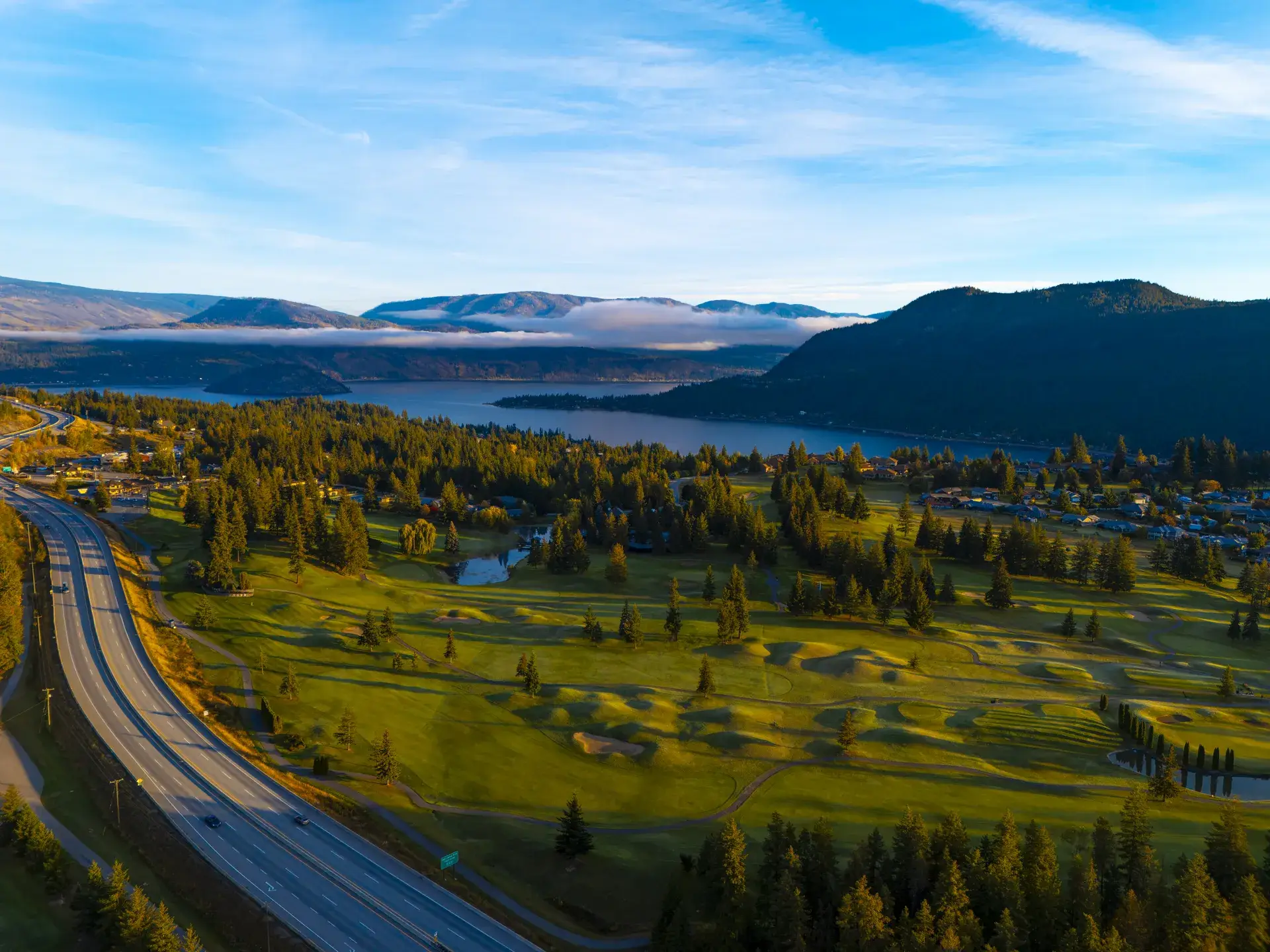 Blind Bay, BC from the air: Shuswap Lake Golf Course, the highway and the lake below The Highlands lots