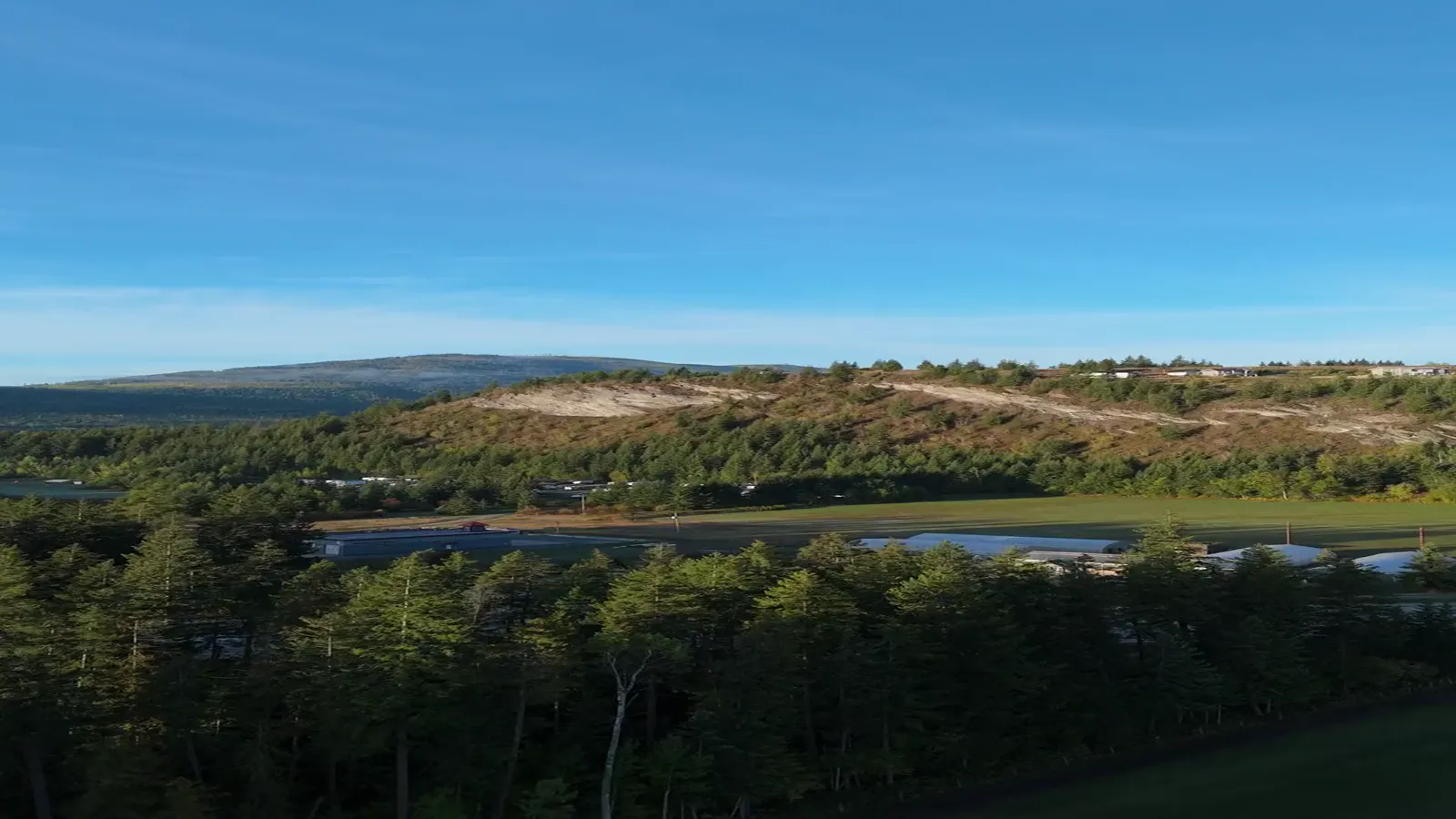Drone flight from Shuswap Lake Golf Course up to the lake-view lots at The Highlands at Blind Bay, a summer home location outside the BC speculation tax