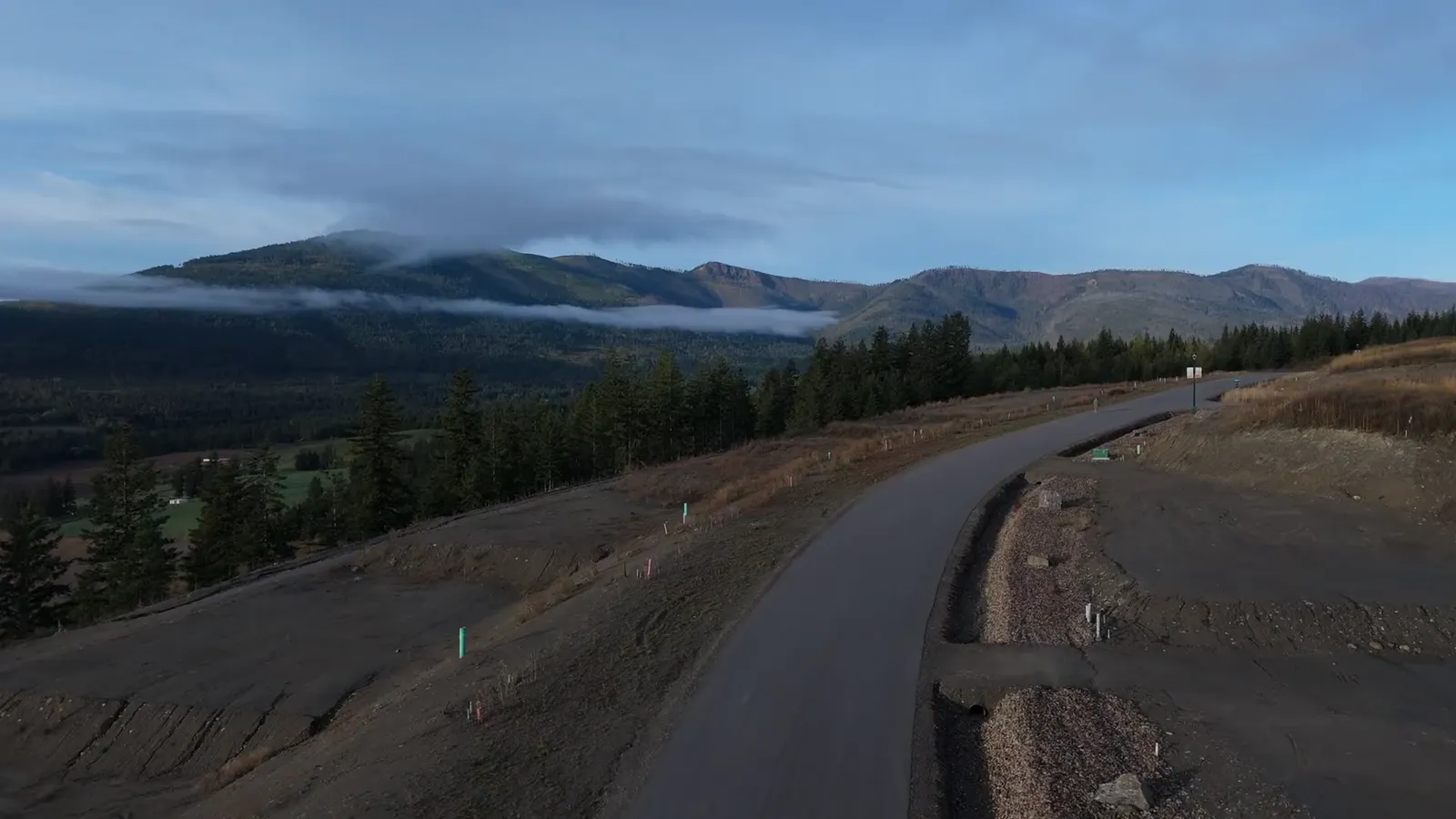 Drone orbit of the Phase 3 lots at The Highlands at Blind Bay, Shuswap Lake and Salmon Arm's side of the lake beyond
