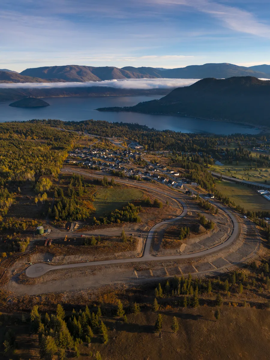 Shuswap Lake view lots: the south rim of The Highlands Phase 3 with the lake and morning fog beyond