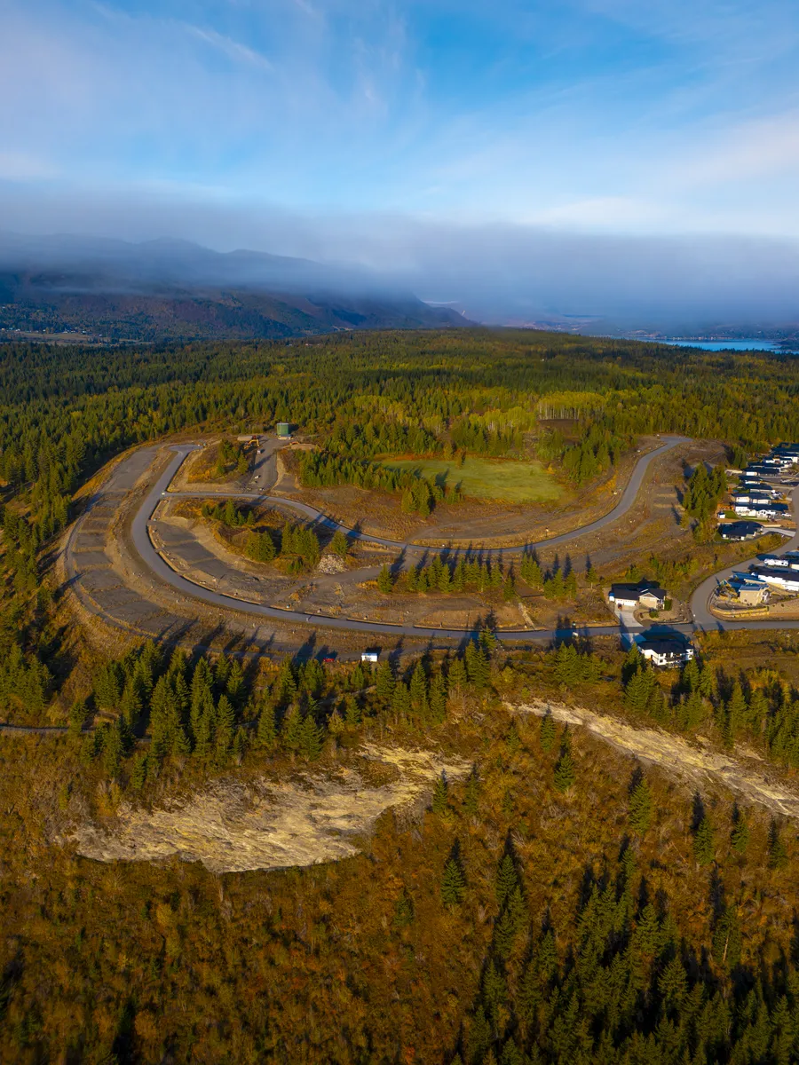 The stepped south-rim building lots at The Highlands Phase 3 from the air, Blind Bay