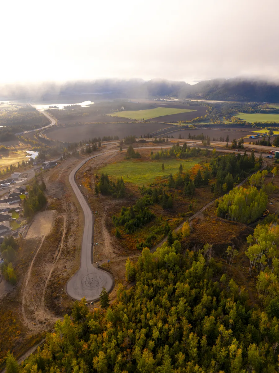 The west side of The Highlands Phase 3 from above, looking south-east down the valley, Blind Bay BC